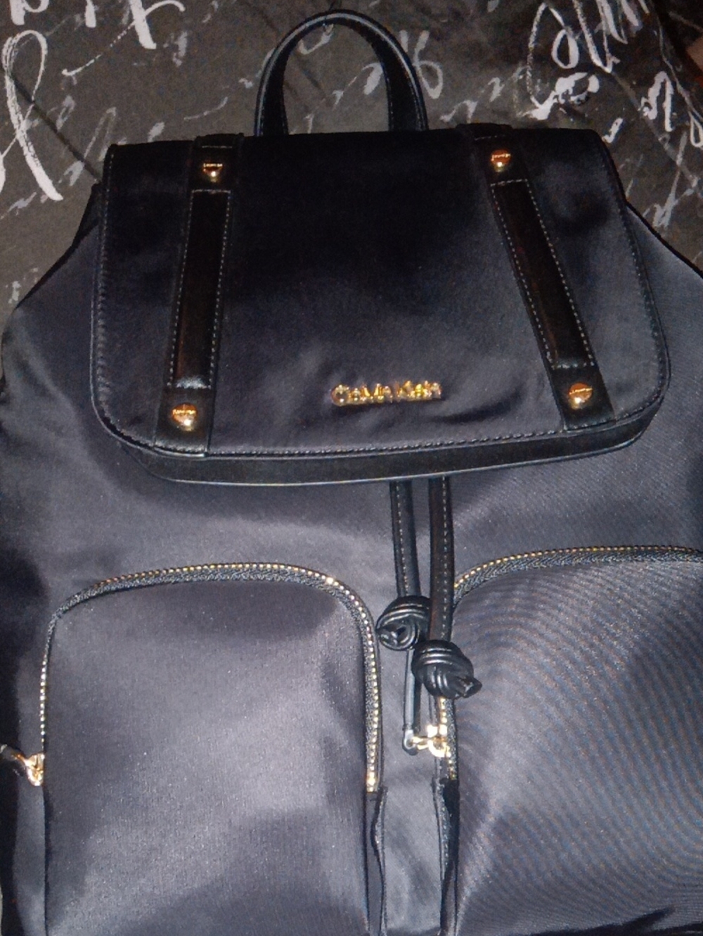 Calvin Klein Black Backpack with Gold Accents